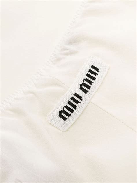 miu miu white tag